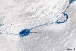 Illustration for article titled Melt Ponds on Ice Sheets Are Chillingly Beautiful
